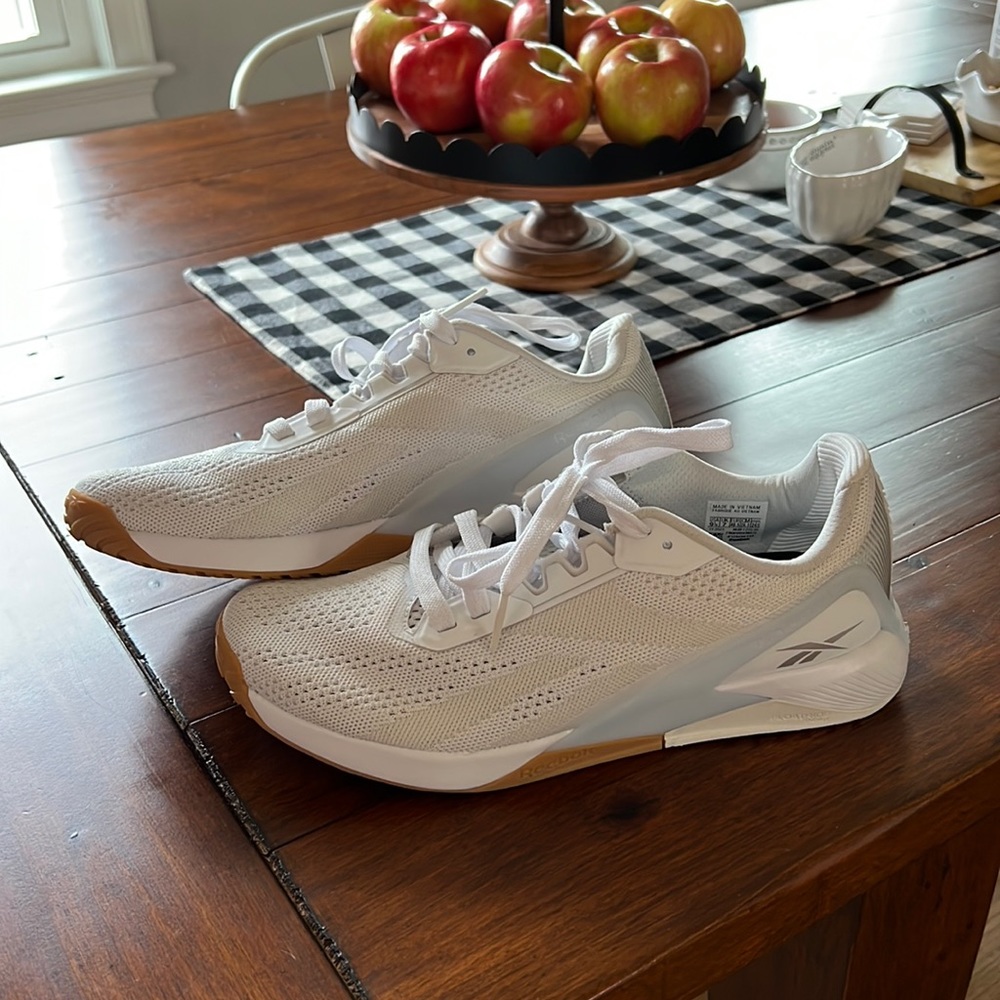 White Reebok Nanos, only worn once or twice in the gym — too big for me ):
